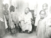 27.05.1906 at Tchwo-Tshow. Review of catechism (Which is given every Sunday). Father Lei Ming-yuan holds in his hand a list of catechumens and his pipe.   [Gallery I, Photo 17. Neg: II 69