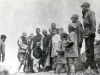 Around 1938-1939, the forehead. Vincent Lebbe with soldiers and porters in the mountains of Shansi.   [Album II Photo 180. Neg: Y 9? 9a]