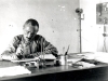 1912 or early 1913. V. Lebbe Chinese writing brush in his office in Tientsin.   [Gallery I, Photo 27. Neg: P 17]