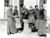 Around 1912-1913, Sien-to Choei-ku, 60 Lily Cotta Tientsin where Father was pastor and where the Father Lebbe, Tientsin, had to spend a few days. From left to right: Joseph Ho, Father Lebbe faithful catechist who accompanies his first exile in 1916 to Hoki, then the home of Father Anthony Cotta, Cotta Father, Father Lebbe, Father Yang and finally another Chinese colleague.   [Gallery I, Photo 28. Neg: P 27]