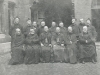 03.01.1927 or 04.01.1927 at Liege. Dom Theodore Neve, abbot of St. Andrew in Bruges have come to Bishop Dom Jehan Chao Joliet Solesmes Abbey in preparation for the founding of a Benedictine abbey in China. This will result in the founding of the Priory of Sichan (in Szechwan). Seated from left to right: Dom Jehan Joliet osb Peters cm (Upper), Bishop Sun, Chao Bishop, Dom Theodore Nève OSB, pastor of Holy Cross Dupuis in Liège; standing, from left to right: X, Lamp cm, the porter, Vincent Lebbe, Abbot Chao (brother of Bishop Chao) Willems cm cm Regniez, Dom Edward Neut, Collard.   [Gallery I, Photo 95. Neg: X 27]