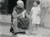 1936 (?), Beijing (?). V. Lebbe met een klein meisje.        [Album II Photo 162. Neg: Z 21? 21 A]
